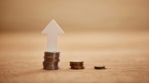 Copper Coins stack with up arrow profits